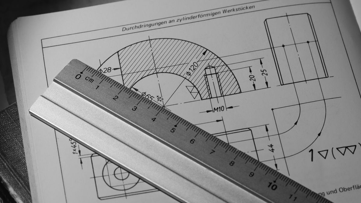 Technical dimensional drawing of a motor mounting flange with a measuring ruler